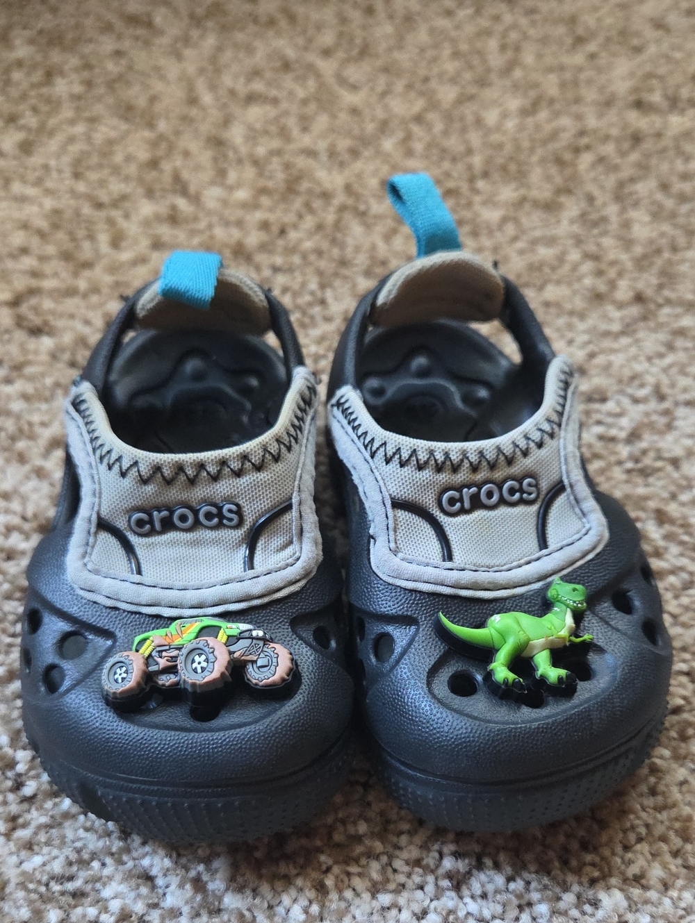 CROCS Kids Black and Beige Clog with Bright Blue Pull Tabs and Charms